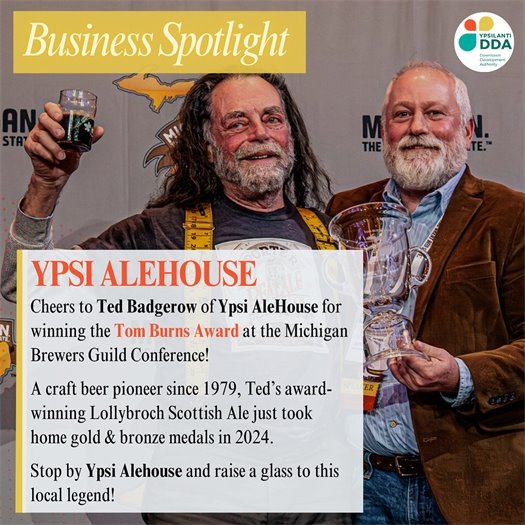 Photograph of the Ted Badgerow of Ypsi Ale house reciving his award at the Michigan Brewers Guild Annual Confrence