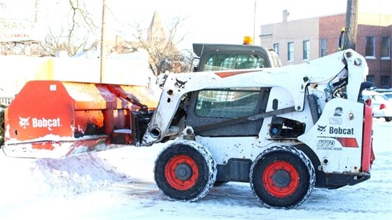 DPW clearing snow from Downtown parking lots